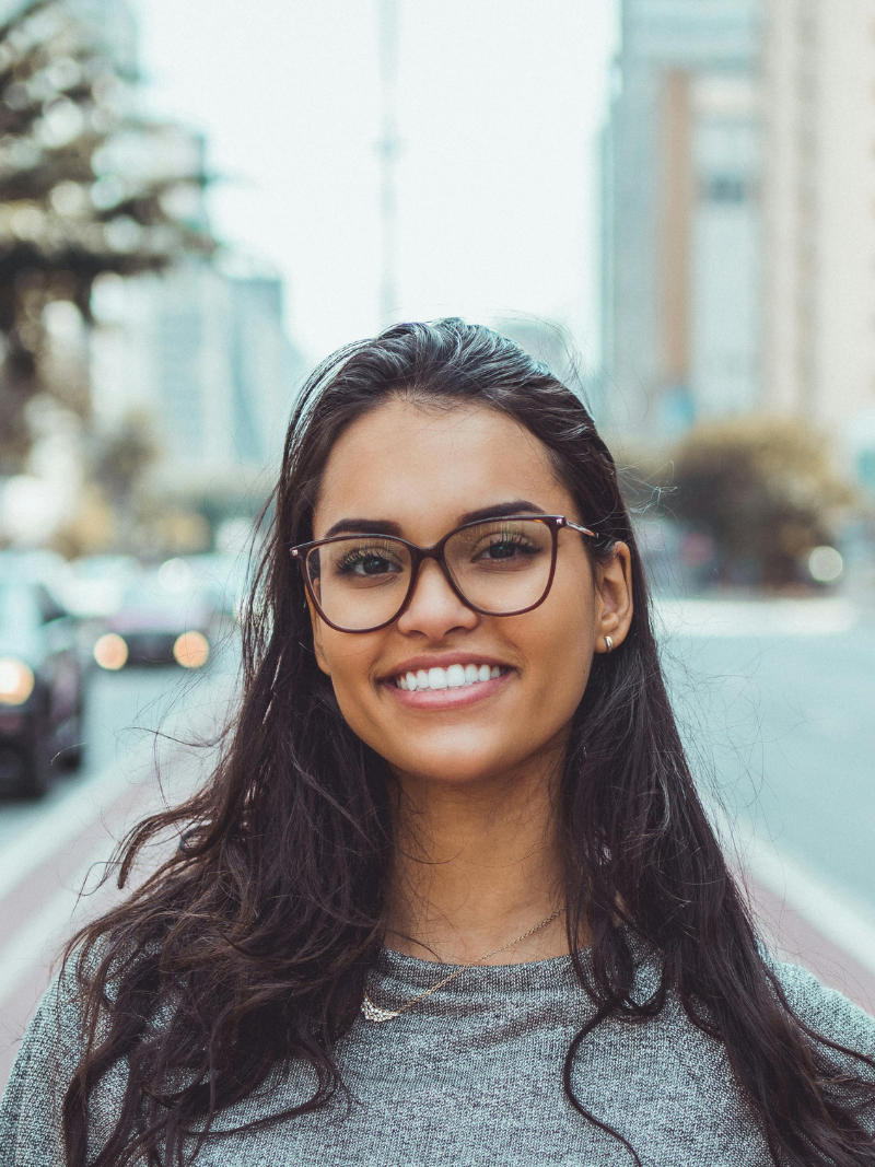 beautiful woman smiling to show her white teeth