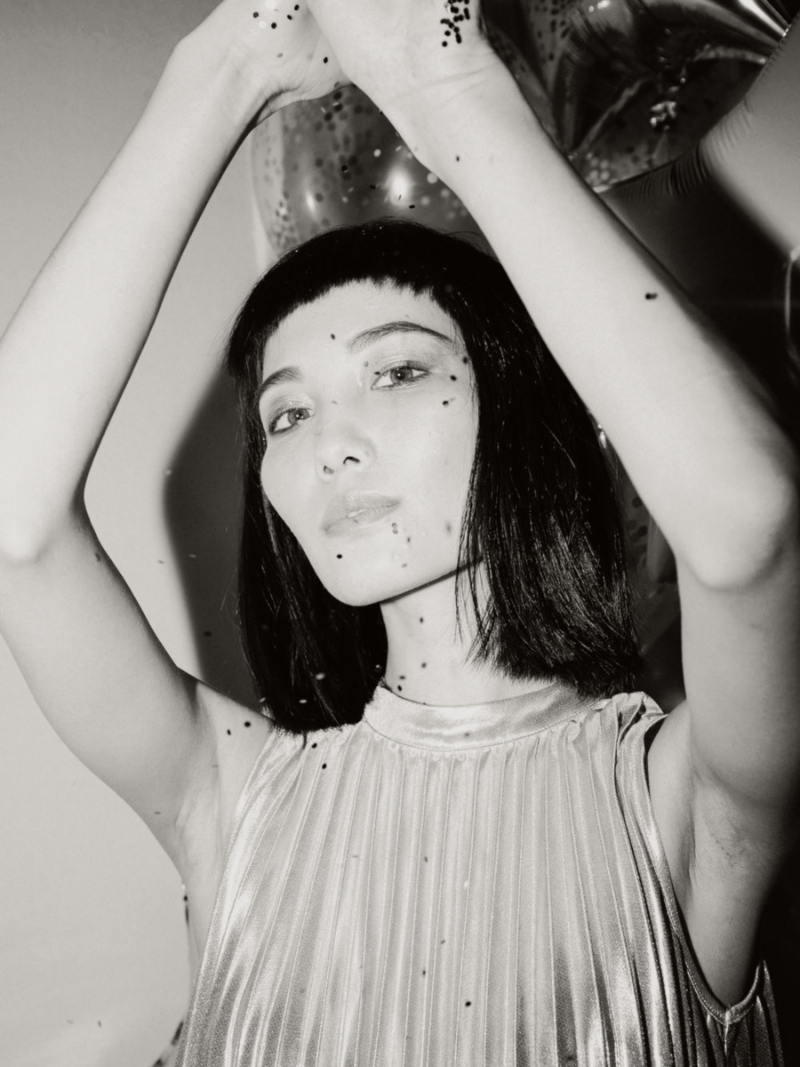 black and white image of woman at party