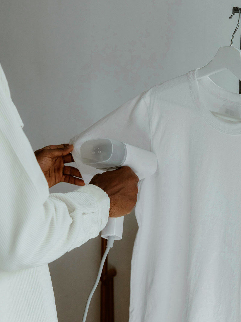 nothing gets put away wrinkly person steaming clothes