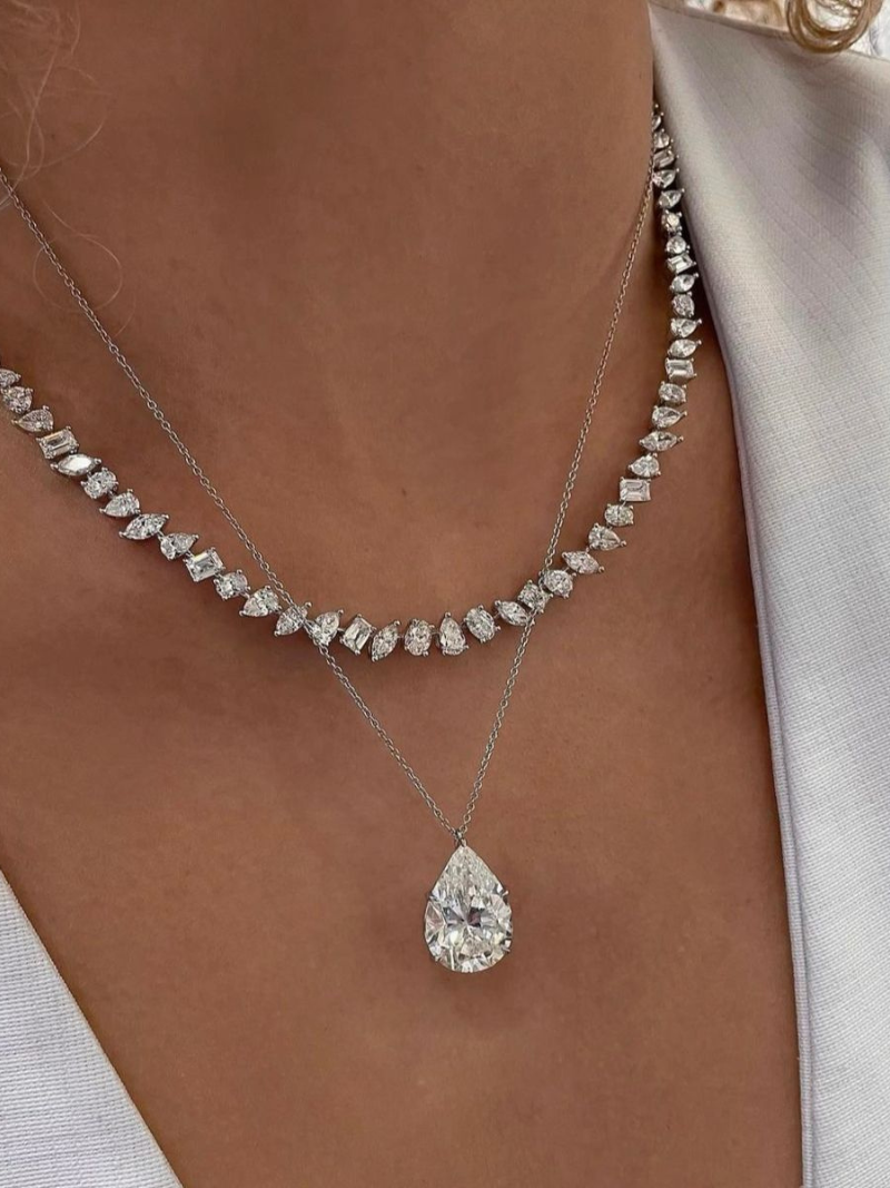 necklace stack with pear shaped diamond